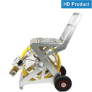A reel with a yellow cable and a HD camera mounted on a skidcrawler with wheels, designed for video inspection systems.