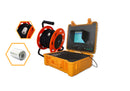 Chimney inspection camera system with control case and interchangeable camera heads.