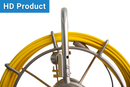 Close up Yellow sewer cable & reel with metal frame on a white background, labeled 'HD Product'.