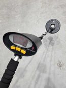 Digital depth gauge on a concrete surface